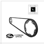 Black carbon bicycle belt drive with matching chainring on a white background