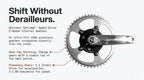 Two-speed bicycle crankset with silver chainring and black planetary gearbox on a white background.