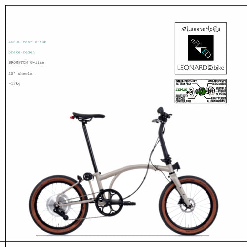 White ZEHUS Brompton G-Line folding e-bike with brown tyres, rear hub motor and front disc brake on a white background.